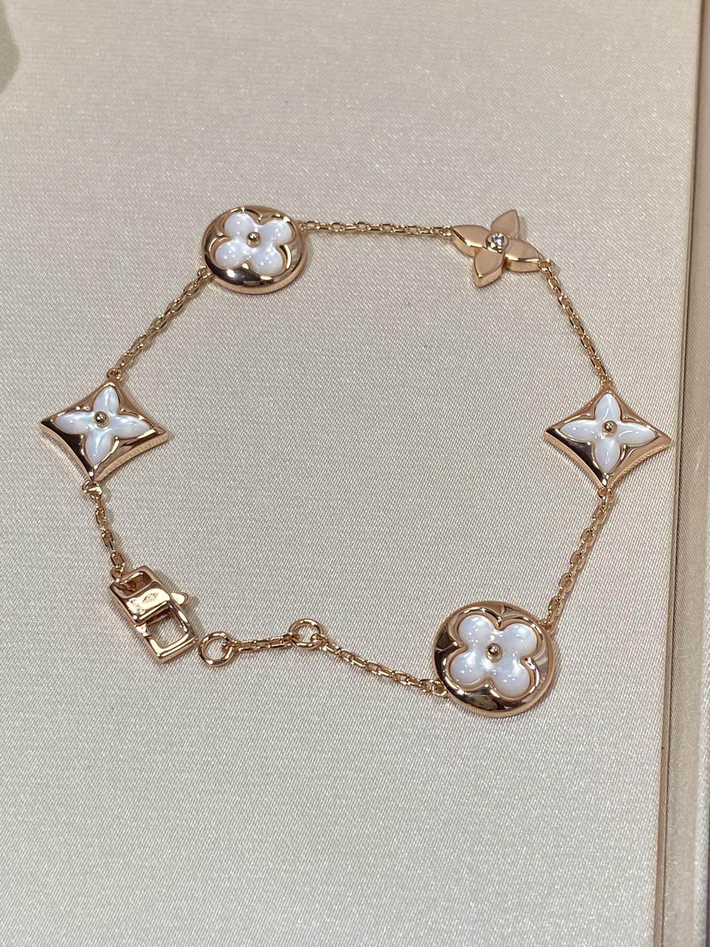 [Spark]STAR AND SUN 5 MOTIF MOP PINK GOLD BRACELET