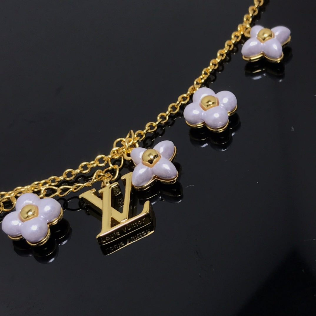 [Spark]LOGO 6 MOTIF STAR AND SUN GOLD BRACELET